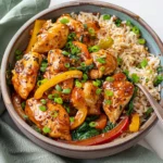 Sweet and Spicy Glazed Chicken Bowl With Garlic Spinach Peppers and Rice