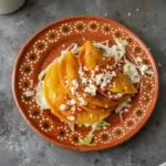 Authentic potato tacos served with fresh toppings