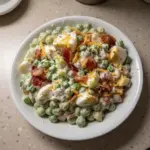 Creamy Southern pea salad with fresh vegetables and dressing