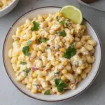 Bowl of colorful Mexican Street Corn Pasta Salad with fresh ingredients