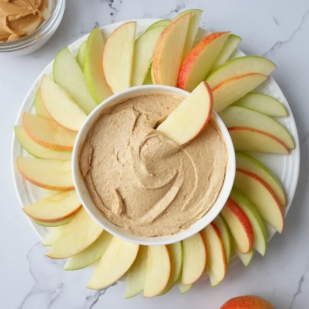Peanut Butter Yogurt Dip served with fresh apple slices.